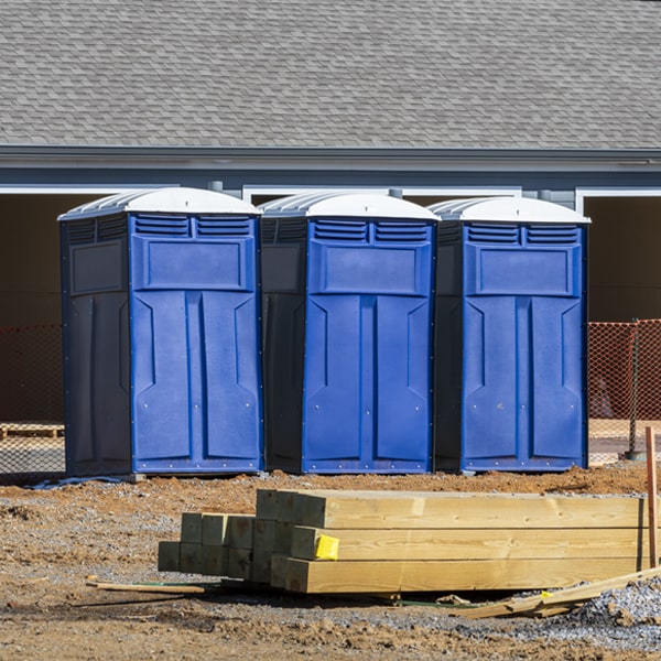 what is the maximum capacity for a single portable toilet in Brasstown